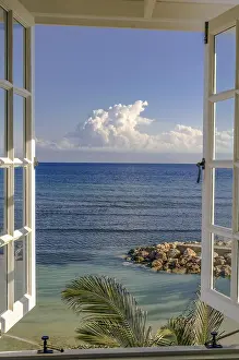 Empty Shoreline Drucke: Loooking out of a window on the ocean