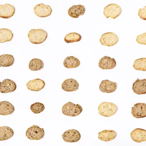 Bright Background Food Images Drucke: Lots of sliced bread baguettes on a white background
