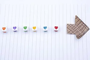 Empty Book Pages Drucke: Love cubes and paper arrow on a notebook