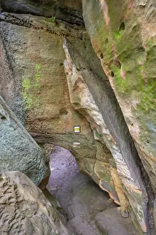 Deserted Sandstone Rock Formations Drucke: Low passage at the sandstone cliffs of