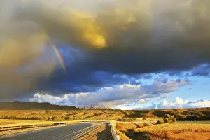 Evening Light Atmosphere Photo Drucke: Low swirling cloud and flat plain covered in orange sunset