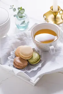 Breakfast Dessert Ideas Drucke: Macarons dessert and cup of tea on white table