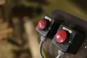 Industrial Building Architecture Drucke: Machine control panel with two red buttons
