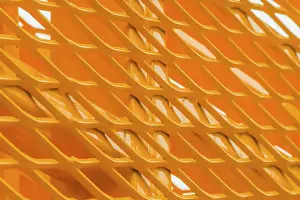 Close Up Metal Details Drucke: Macro of yellow metal structure with v-shaped patterns
