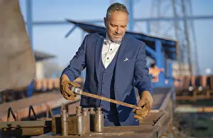 Caucasian Male Drucke: Mafia boss with rough tools at the harbour