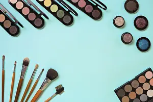 Blue Background Image Drucke: Make up essentials. Set of professional make up brushes