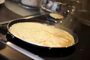 High Calorie Food Images Drucke: Making crepes in the pan