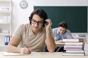 Educational Institution Image Drucke: Two male students in the classroom