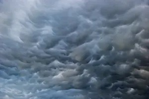 Cloudy Weather In Europe Drucke: Mammatus clouds, dramatic cloud atmosphere