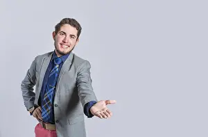 Adult Man Looking At Camera Drucke: Man extending his hand inviting