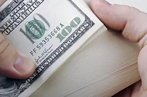 Hundred Dollar Bill Stack Drucke: Man fanning large stack of one hundred dollar bills