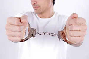 Handcuffed Man Drucke: Man with handcuffs