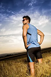 Recreational Activity Photo Drucke: Man jogging through the fields