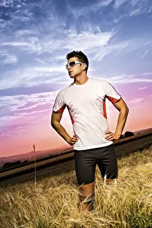 Athletic Man Drucke: Man jogging through the fields