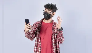 Communicative Young Adult Male Drucke: Man making video call isolated