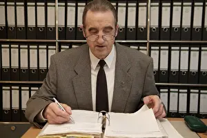 Elderly Woman At Work Drucke: Man in the office