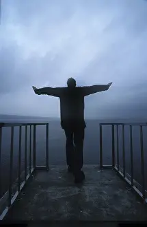 Full Body Length Man Drucke: Man at a pier