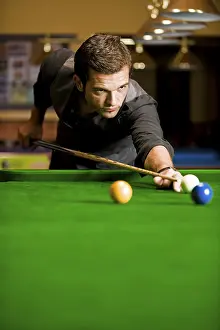 Leisure Activity Drucke: Man playing billiard