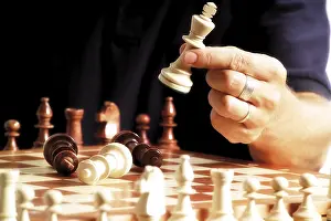 Leisure Activity Images Drucke: Man playing chess, closeup