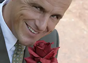 Mann mit Rose