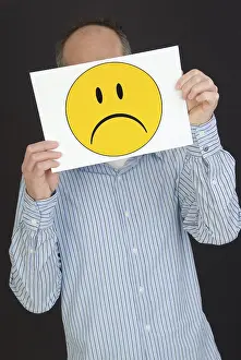 Disappointed Person Drucke: Man with sad smiley face