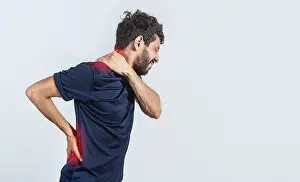 Body Aches Drucke: Man with spine and shoulder problems