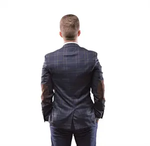 Caucasian Man Photography Drucke: Man stands with his back to the camera and looking at something
