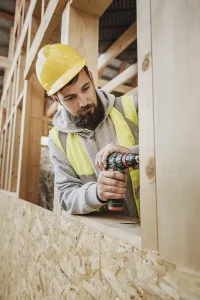 Construction Industry Jobs Drucke: Man working carpentry
