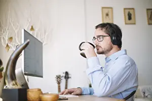 Modern Office Architecture Drucke: Man working computer drinking