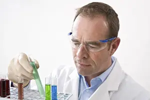 Chemistry Experiment Drucke: Man working on an experiment in a laboratory