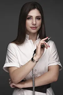 Beauty Professional Drucke: Manicurist in working form with tools in hand