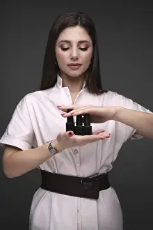 Professional Nail Technician Drucke: Manicurist in working form with tools in hand