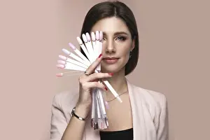 Nail Care Drucke: Manicurist in working form with tools in hand