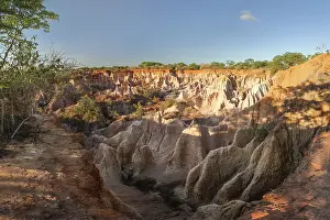 Eroded Rock Formations Drucke: Marafa (Hell's kitchen) canyon cliffs in sunset light