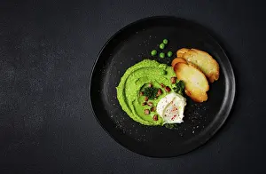 Breakfast Dish Drucke: Mashed peas, with boiled egg, fried bacon