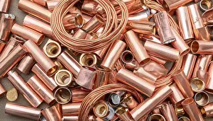 Industrial Building Construction Drucke: Material, metal, copper, a large quantity of pipes and pipe sections