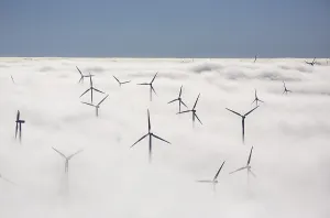 North Rhine Westphalia Renewable Energy Drucke: Wind turbines covered by low clouds