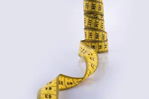 Studio Photography Drucke: Measuring tape on a white background