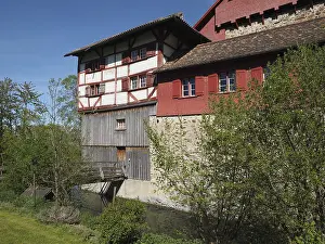 Medieval Castle Switzerland Drucke: Medieval castle with timber elements and red facade