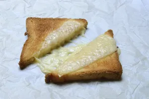 Melted Cheese Drucke: Melted processed cheese with toast