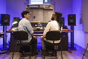 Music Production Studio Drucke: Two men collaborating in a professional recording studio