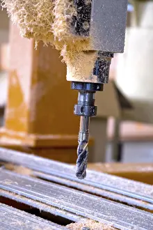 Industrial Building Drucke: Metal drill in plastic garbage