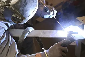 Industrial Craftsman Drucke: Metal worker during welding work