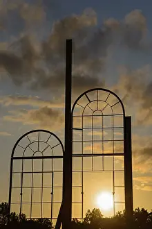 Northern German Landscapes Drucke: Two metallic window frames stand out against the dramatic sunset sky