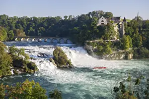 Switzerland Waterfall Drucke: Mighty waterfall with a castle and bridge