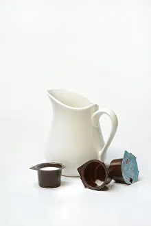 Dairy Product Drucke: A milk can and milk in portion pack