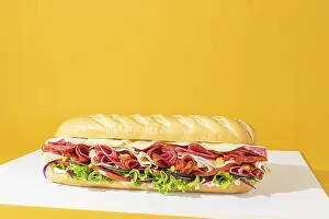 Yellow Background Food Drucke: Minimalist composition of a complete sandwich