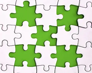 Missing Jigsaw Puzzle Drucke: Missing jigsaw puzzle on green background with customizable space for text or ideas