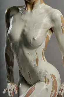Studio Shot Of A Female Model Drucke: Model covered in white plaster
