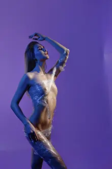 Elegantly Posed Model Drucke: A model poses elegantly, wrapped in plastic